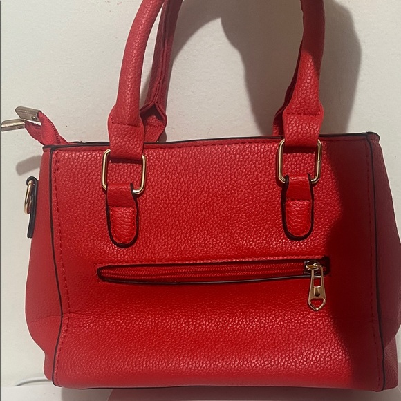 Elegant Red Handbag with Pom-Pom Charm - Picture 2 of 5